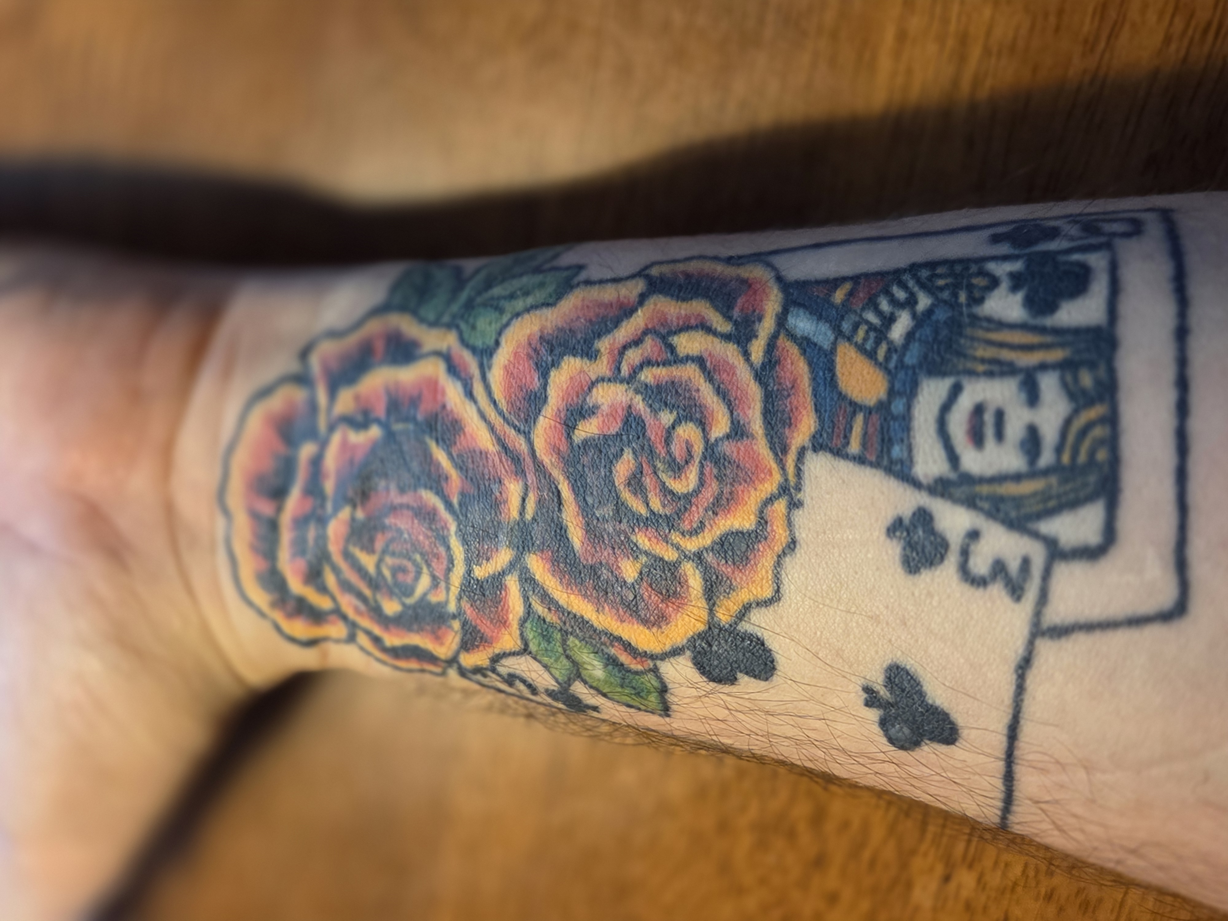 Q3 clubs tattoo — the hand that won the WSOP Circuit ring